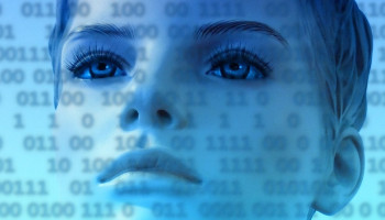Image of woman's face overlaid with binary code.